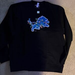 Detroit Lions Primary Logo Holiday Lights Crew Neck Sweatshirt